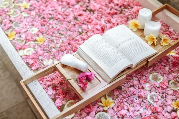 bigstock Bath tub with flower petals an 289054378 e1565266807687